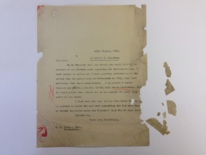 A typed letter with fragments before lining