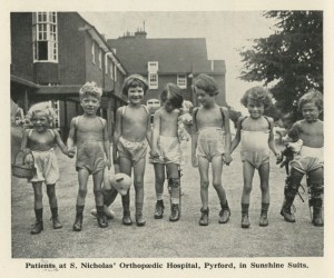 Photo of children in sunshine suits at St Nicholas' Home, Pyrford, Surrey, taken from the annual report for the Children's Union, 1927