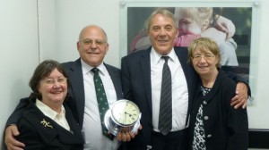 Michael and Richard Pollard and their wives with the ship’s clock