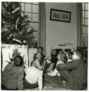 Children in one of The Society’s children’s homes in the 1940s alongside their Christmas tree