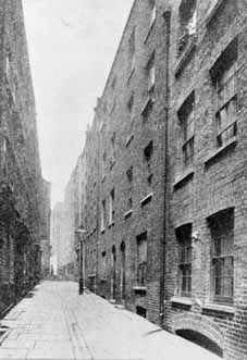 The problems of London poverty were foremost in Edward Rudolf's thoughts when he established the Waifs and Strays' Society. Many of the Society's first children came from deprived urban areas like the street shown here. 