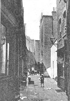 Streets like this one were often overcrowded with tenants, with some families all living together in one room.