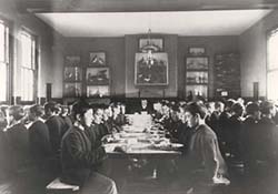Boys eating in a dining hall