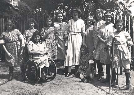 These girls' teacher, Miss Hutchinson, taught at St Nicholas' for over 40 years. She made sure that the children were always out in the bright sunshine on trips. Disabled children were never 'hidden away' by the Society - but integrated into everyday life.