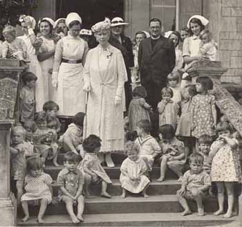 Queen Mary took an active interest in the Society's work, and she knitted scarves for children in the homes. They were donated anonymously so that they would be worn, rather than kept as souvenirs. King George V and Queen Mary were both patrons of the Waifs and Strays' Society. Before television became popular, seeing the King or Queen was very rare and a huge treat - and these children must have felt very honoured.