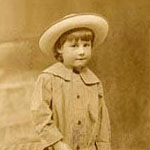 girl in
							hat and coat