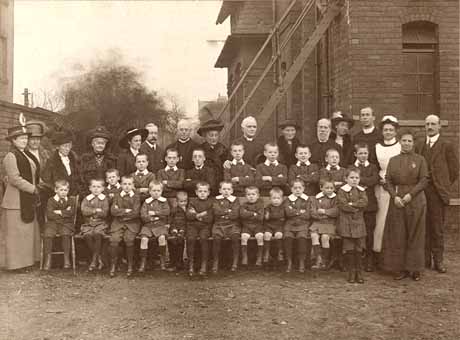 A formal photograph taken at the Home's opening at the new premises