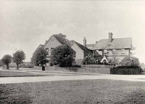 Front view of the Home and its large grounds.