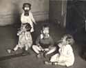 Children wearing gas masks